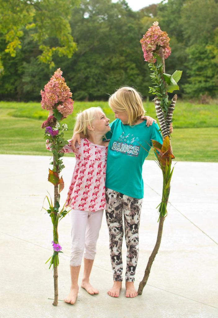 Make a Beautiful Hiking Stick from Nature. A fun nature activity that fits both younger and older kids. Rain or Shine Mamma. #naturecraft #natureactivities #nature #forestschool